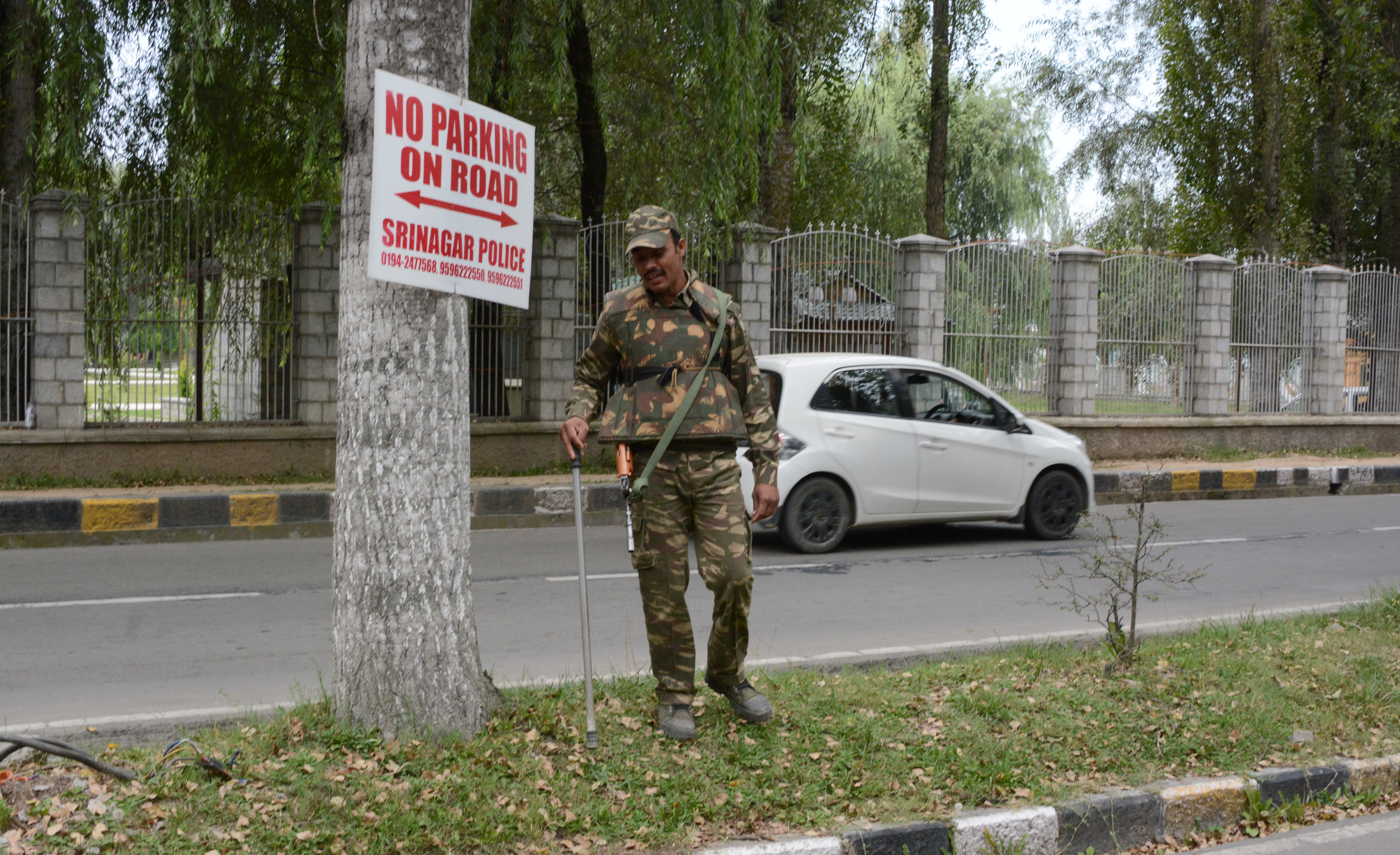 Kashmir Security person stands guard outisde SKICC which is now Sub Jail where all top main stream Leaders and Former MLA s were under detention after their arrest Umar Ganie
